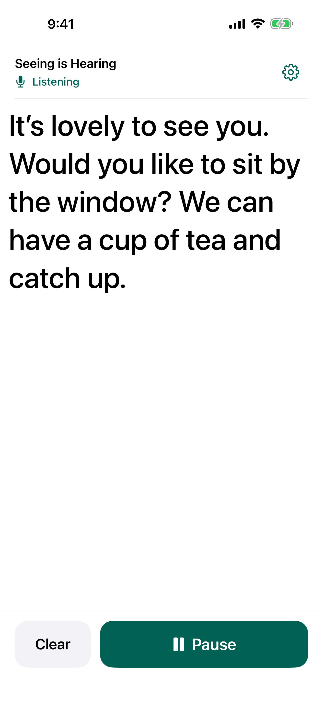Seeing is Hearing on iPhone, showing large live captions in light appearance.